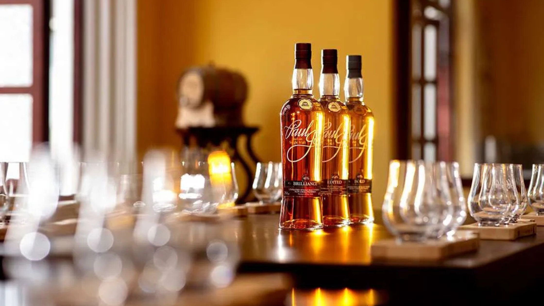 future of paul john whiskies with paul john whisky bottles